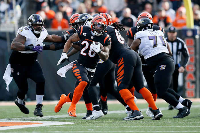 Cincinnati Bengals running back Joe Mixon (28) breaks away for a long carry in the first quarter of the NFL Week 16 game between the Cincinnati Bengals and the Baltimore Ravens at Paul Brown Stadium in downtown Cincinnati on Sunday, Dec. 26, 2021. The Bengals led 31-14 at halftime. Baltimore Ravens At Cincinnati Bengals Week 16